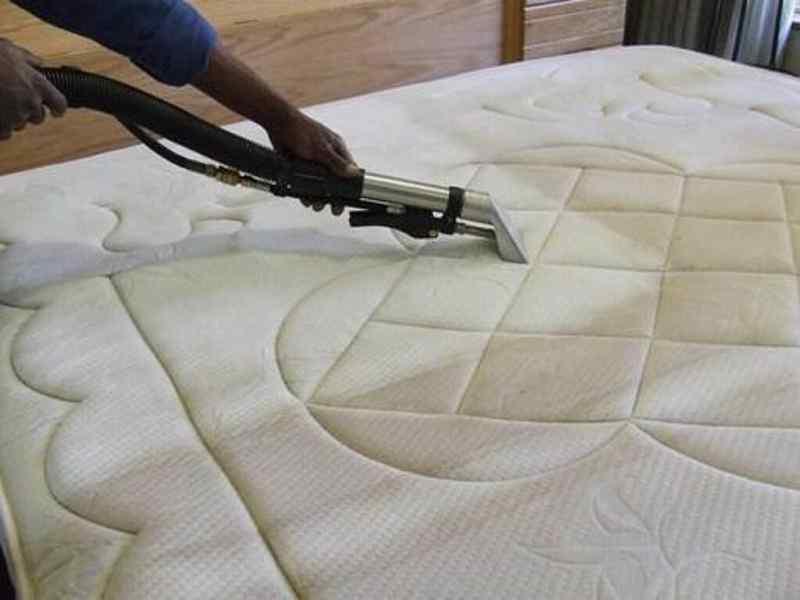 A cleaner extraction-cleaning a mattress by hand